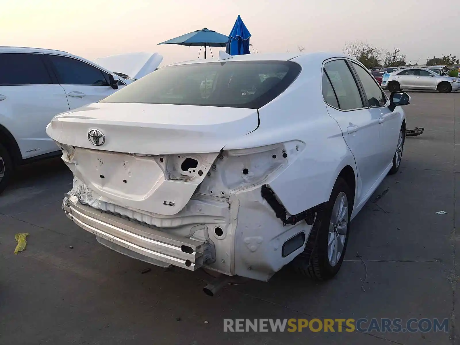 4 Photograph of a damaged car 4T1B11HK9KU228930 TOYOTA CAMRY 2019