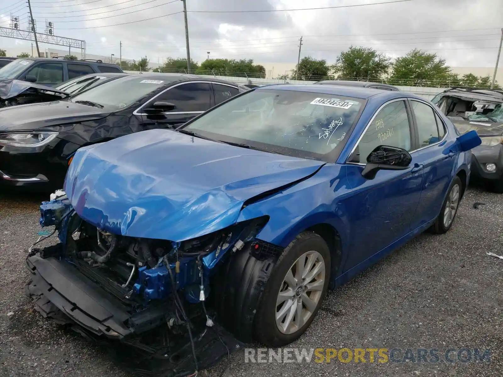 2 Photograph of a damaged car 4T1B11HK9KU229771 TOYOTA CAMRY 2019