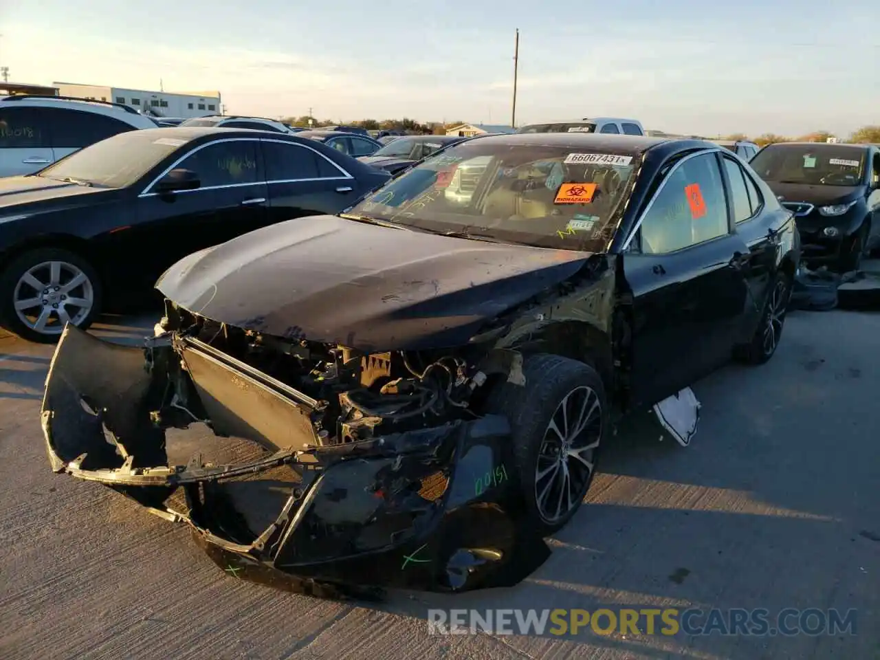 2 Photograph of a damaged car 4T1B11HK9KU231133 TOYOTA CAMRY 2019