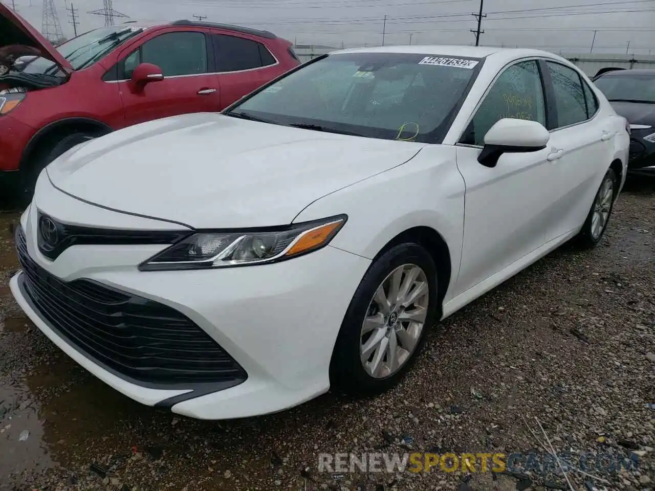 2 Photograph of a damaged car 4T1B11HK9KU233402 TOYOTA CAMRY 2019