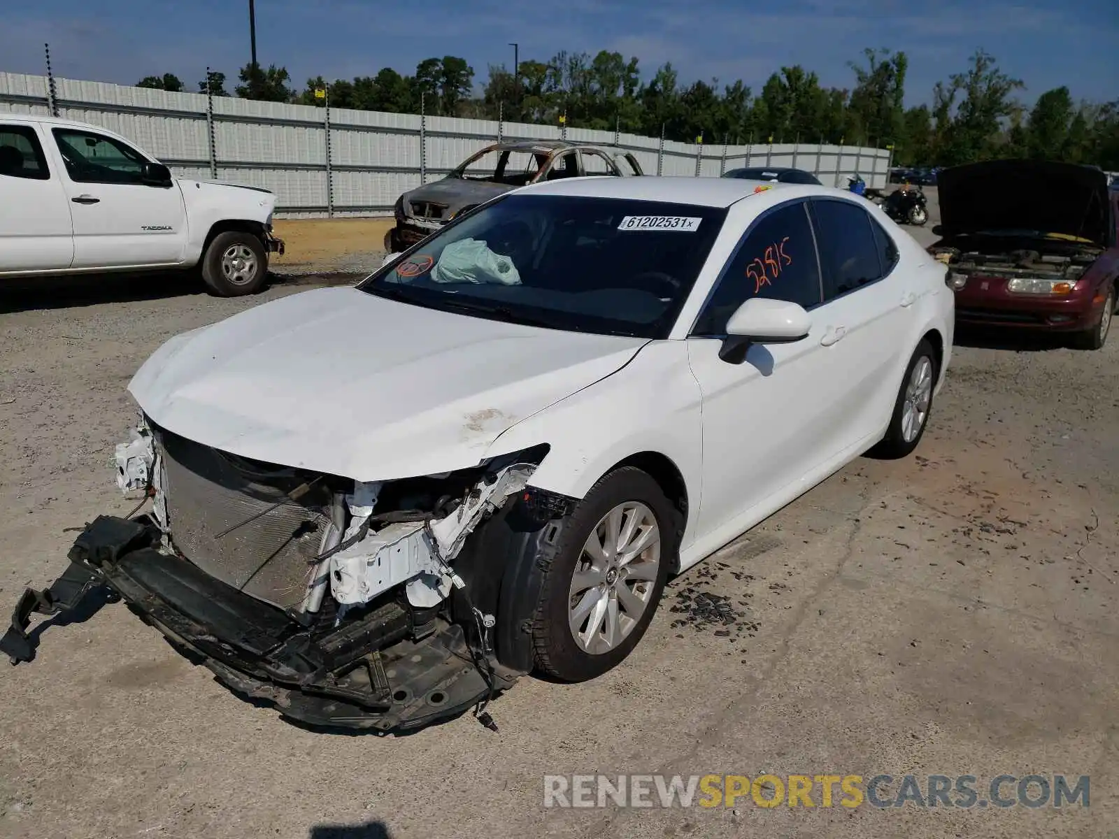 2 Photograph of a damaged car 4T1B11HK9KU233724 TOYOTA CAMRY 2019