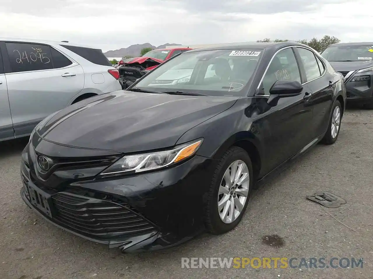 2 Photograph of a damaged car 4T1B11HK9KU240317 TOYOTA CAMRY 2019