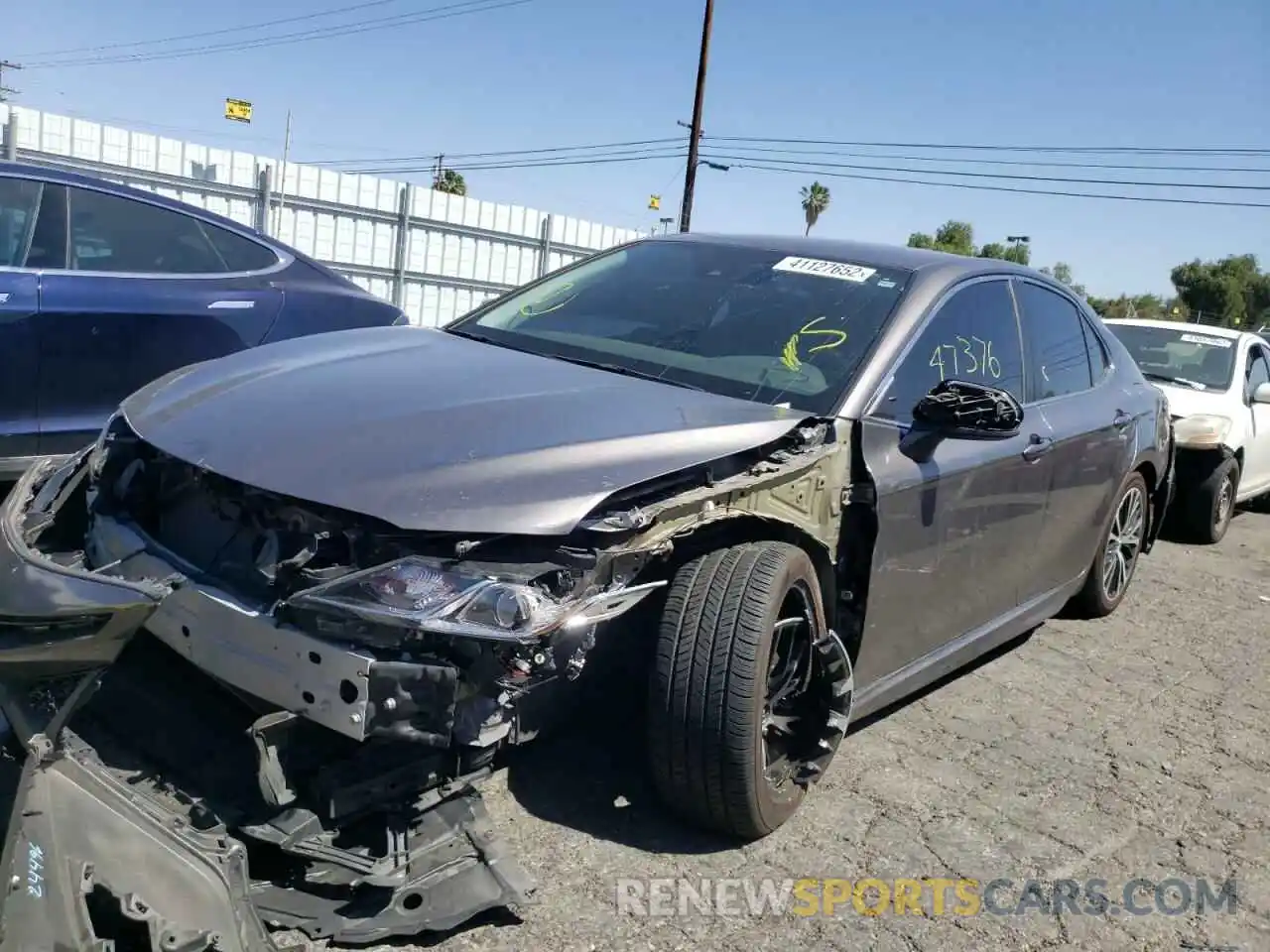 2 Photograph of a damaged car 4T1B11HK9KU241371 TOYOTA CAMRY 2019