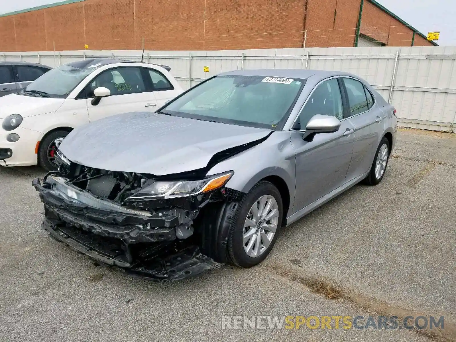 2 Photograph of a damaged car 4T1B11HK9KU242472 TOYOTA CAMRY 2019