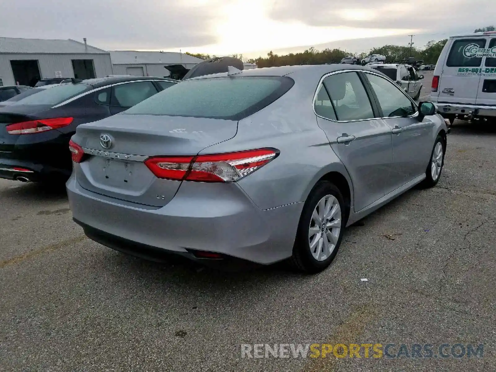 4 Photograph of a damaged car 4T1B11HK9KU242472 TOYOTA CAMRY 2019