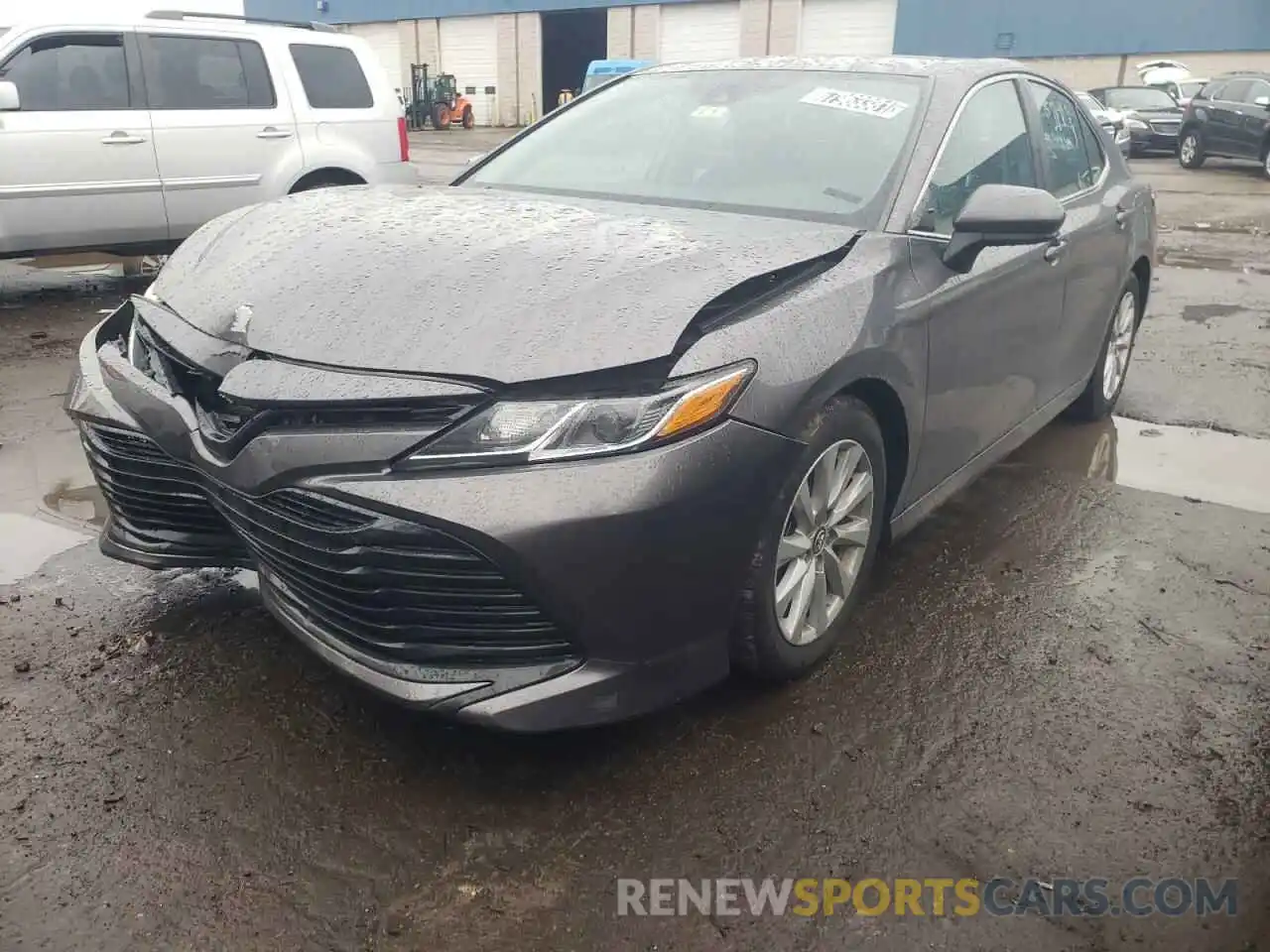 2 Photograph of a damaged car 4T1B11HK9KU243850 TOYOTA CAMRY 2019