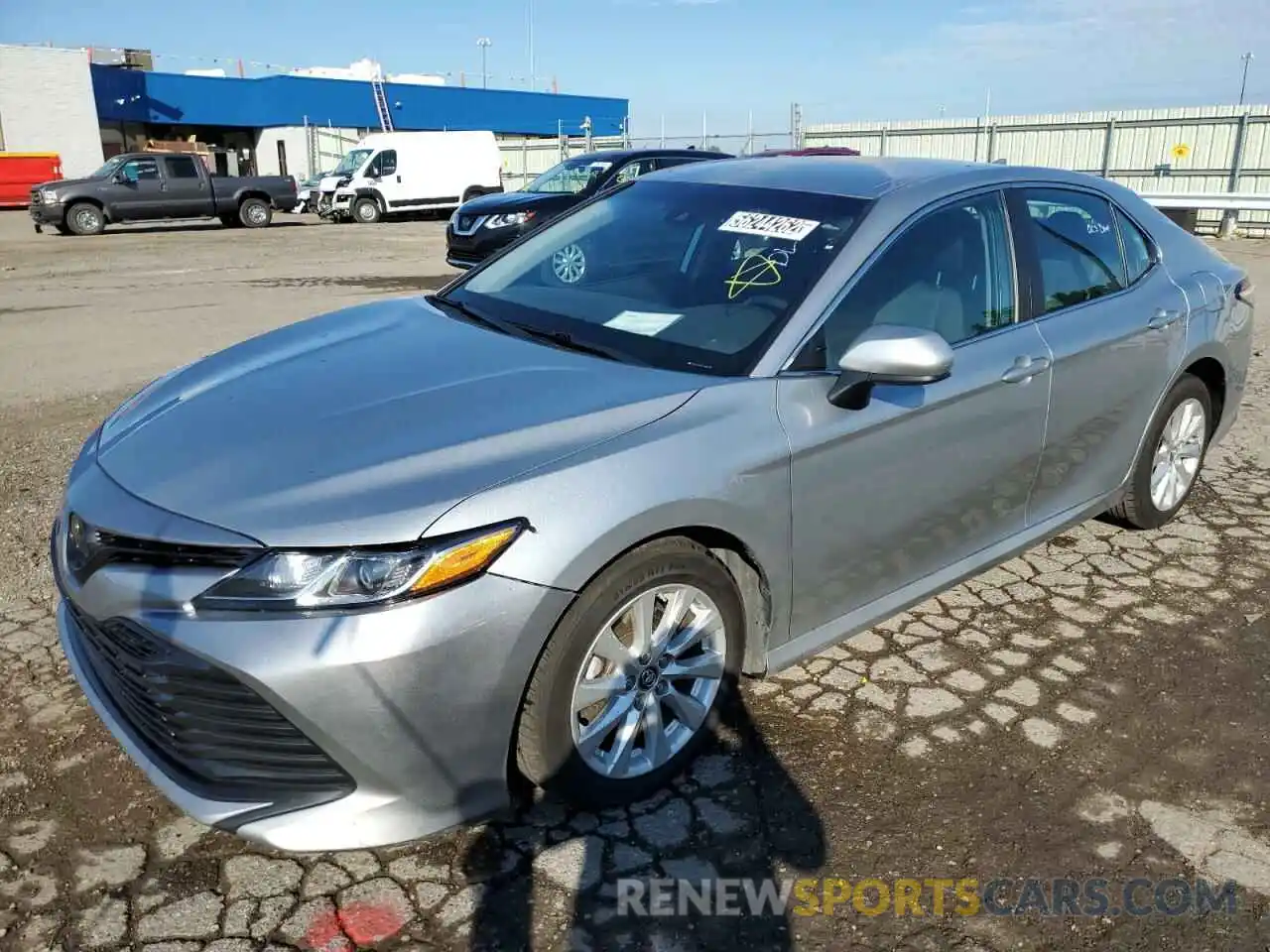 2 Photograph of a damaged car 4T1B11HK9KU243864 TOYOTA CAMRY 2019