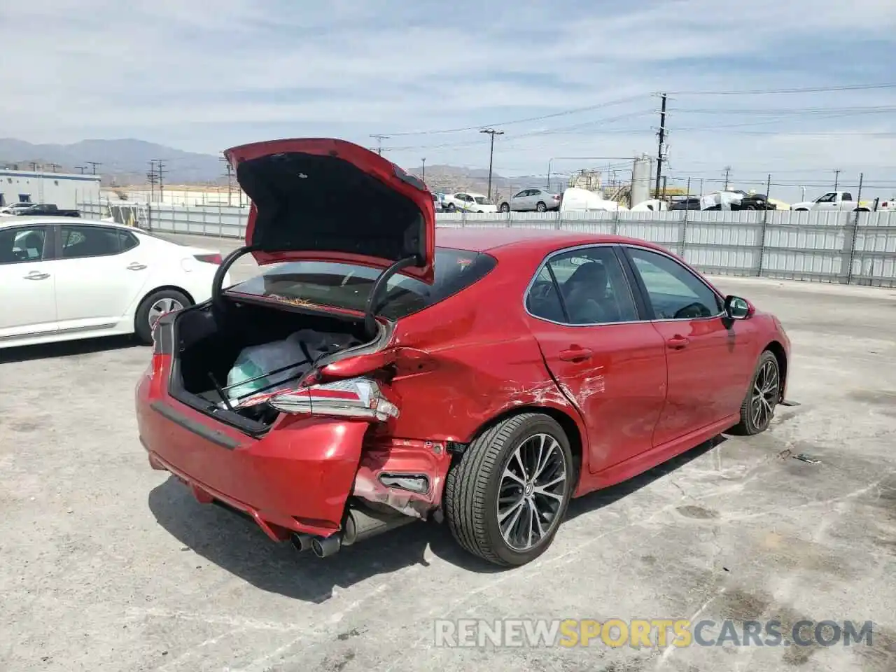 4 Photograph of a damaged car 4T1B11HK9KU248014 TOYOTA CAMRY 2019