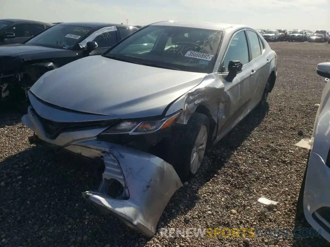 2 Photograph of a damaged car 4T1B11HK9KU258946 TOYOTA CAMRY 2019