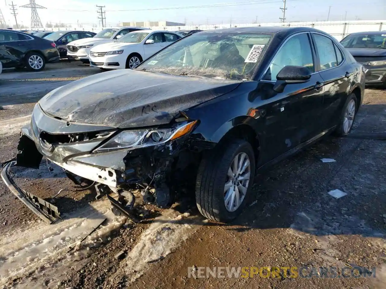 2 Photograph of a damaged car 4T1B11HK9KU263709 TOYOTA CAMRY 2019