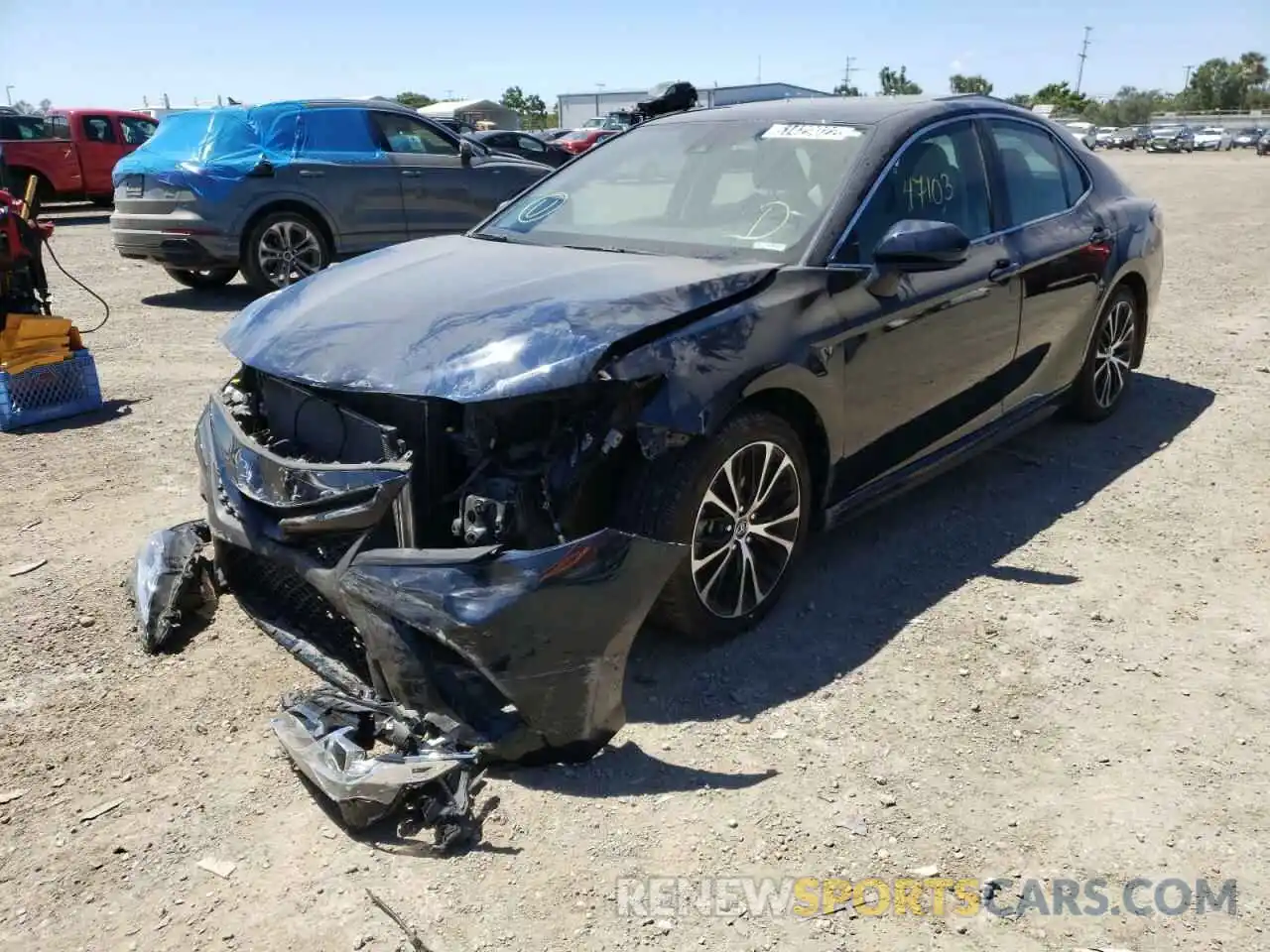 2 Photograph of a damaged car 4T1B11HK9KU273575 TOYOTA CAMRY 2019