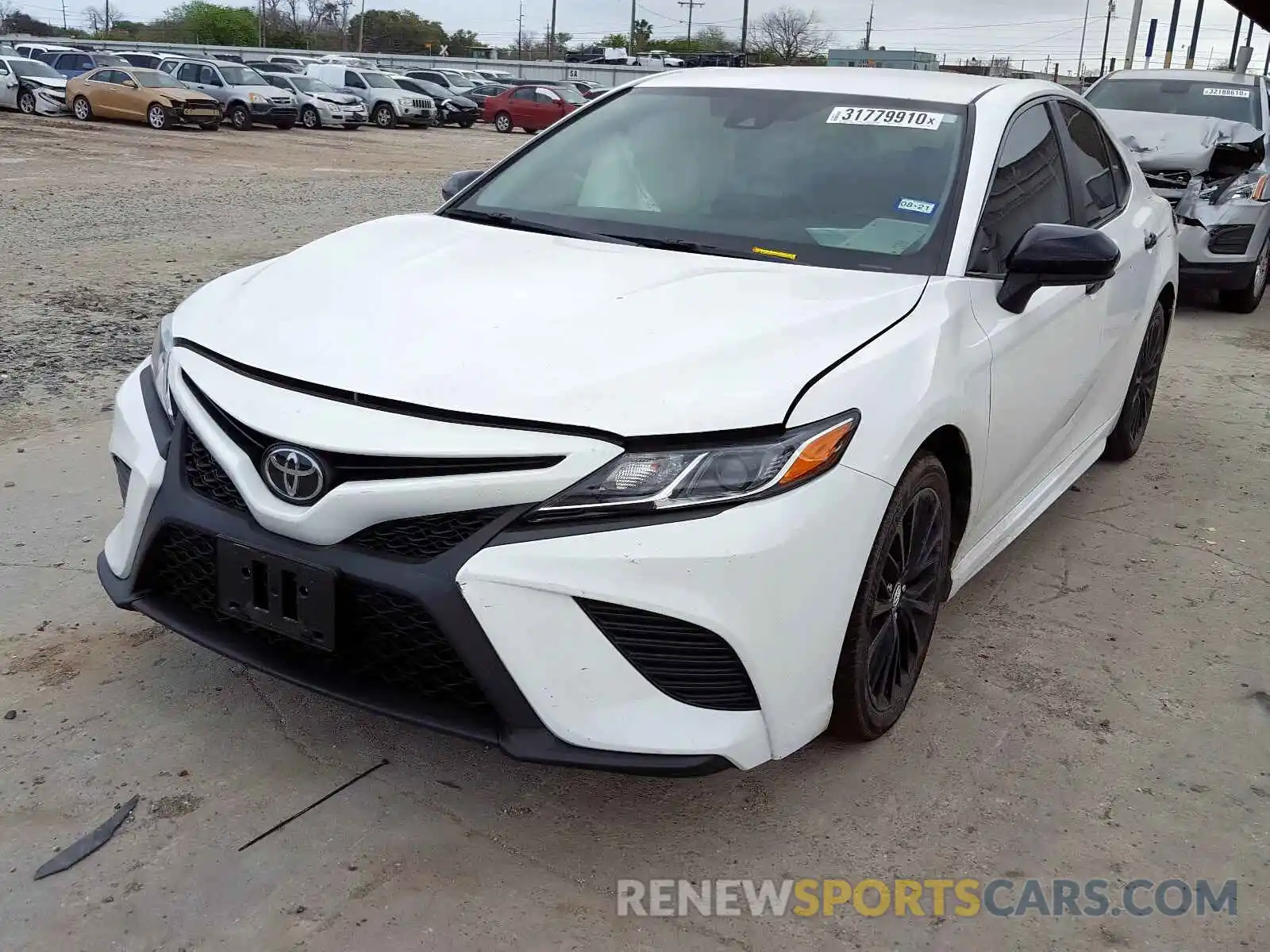 2 Photograph of a damaged car 4T1B11HK9KU277299 TOYOTA CAMRY 2019