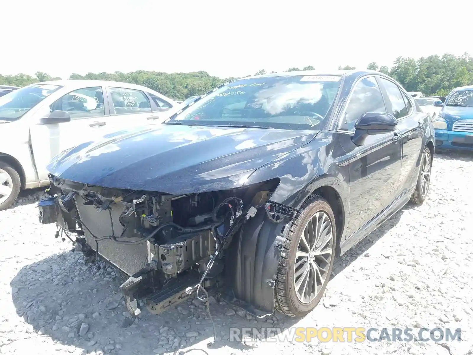 2 Photograph of a damaged car 4T1B11HK9KU283068 TOYOTA CAMRY 2019