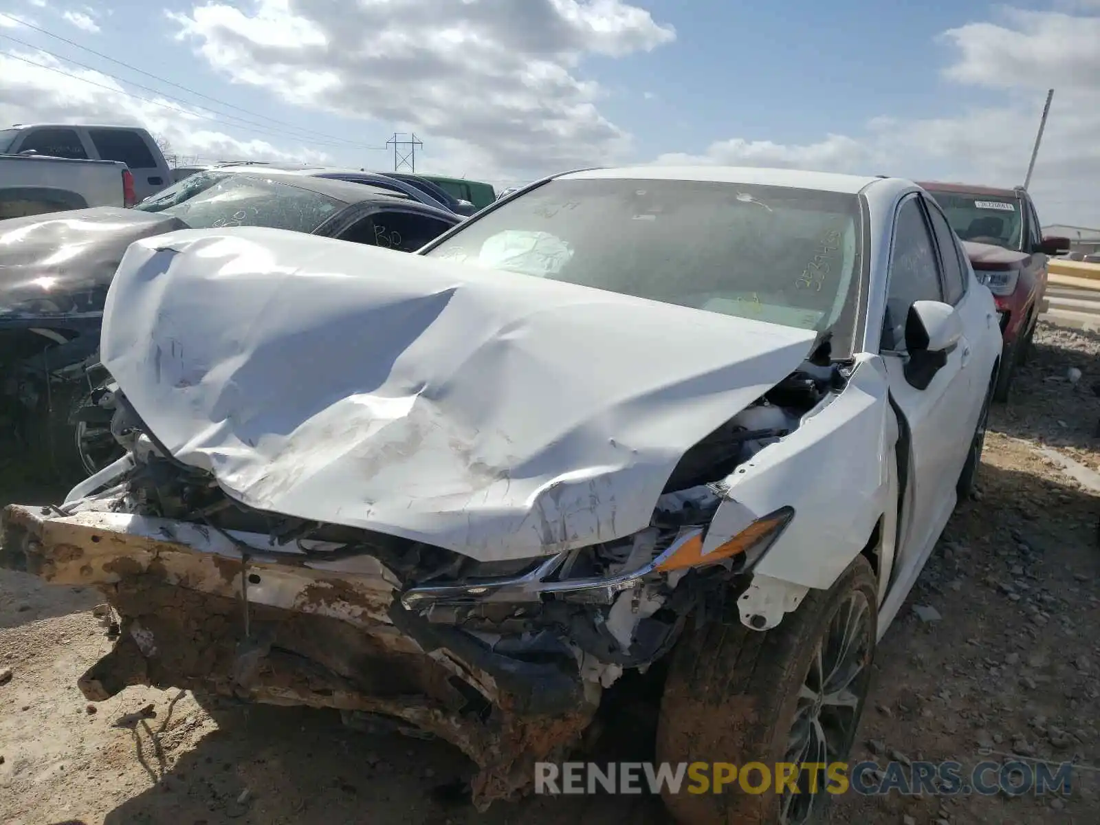 2 Photograph of a damaged car 4T1B11HK9KU294099 TOYOTA CAMRY 2019