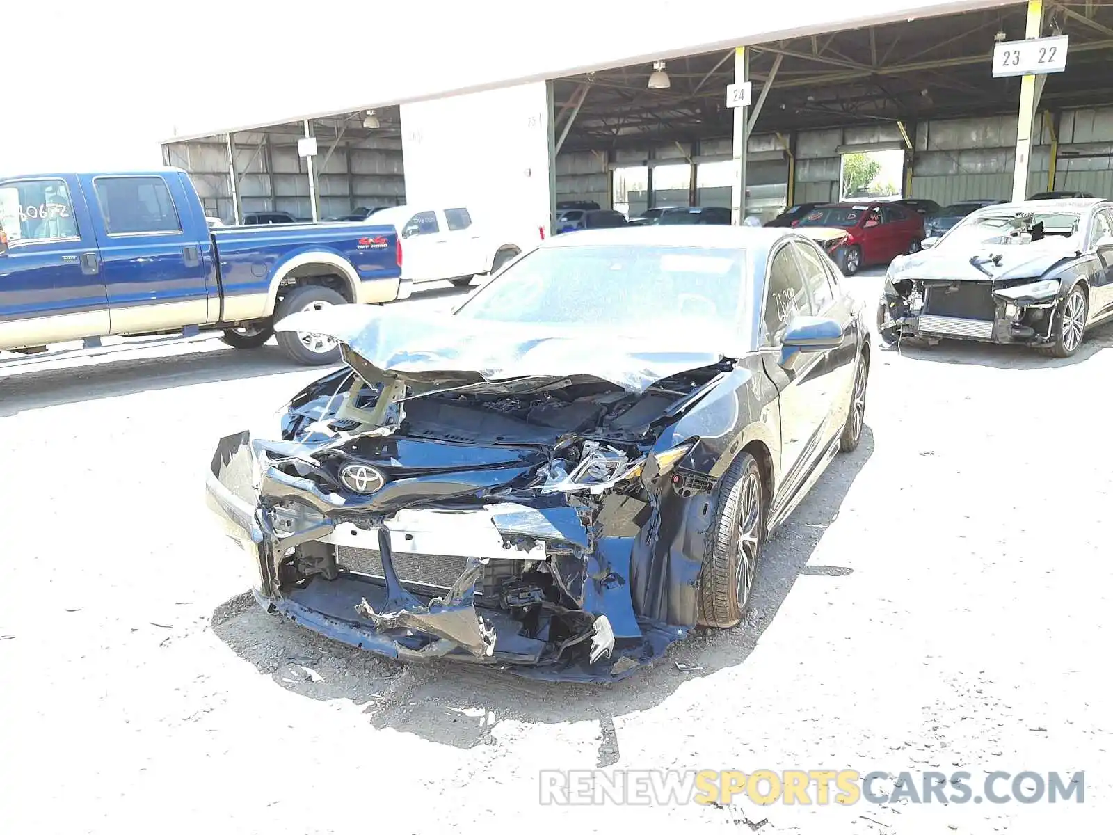 2 Photograph of a damaged car 4T1B11HK9KU297018 TOYOTA CAMRY 2019