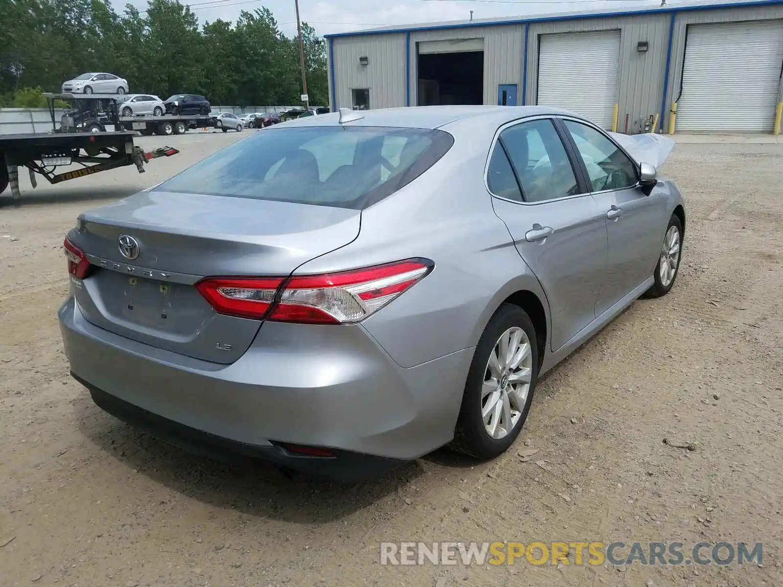 4 Photograph of a damaged car 4T1B11HK9KU679629 TOYOTA CAMRY 2019