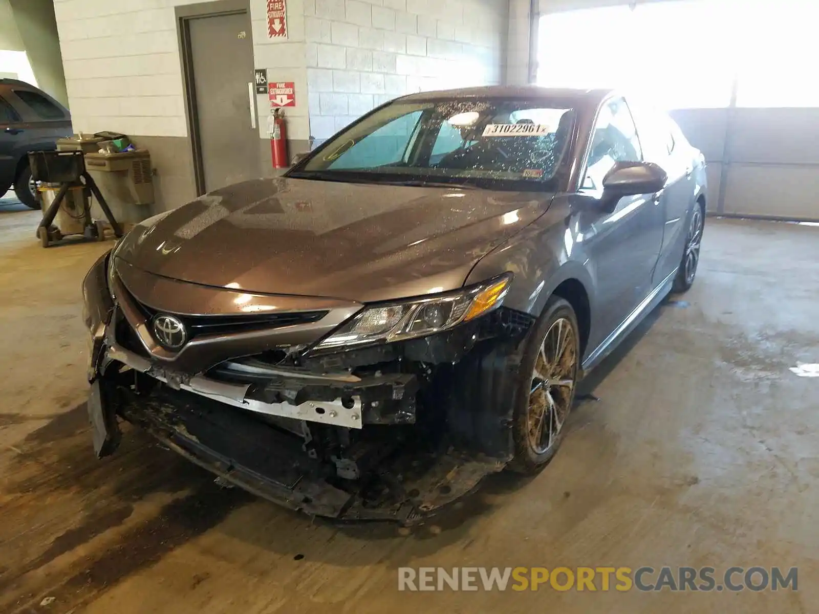 2 Photograph of a damaged car 4T1B11HK9KU684684 TOYOTA CAMRY 2019