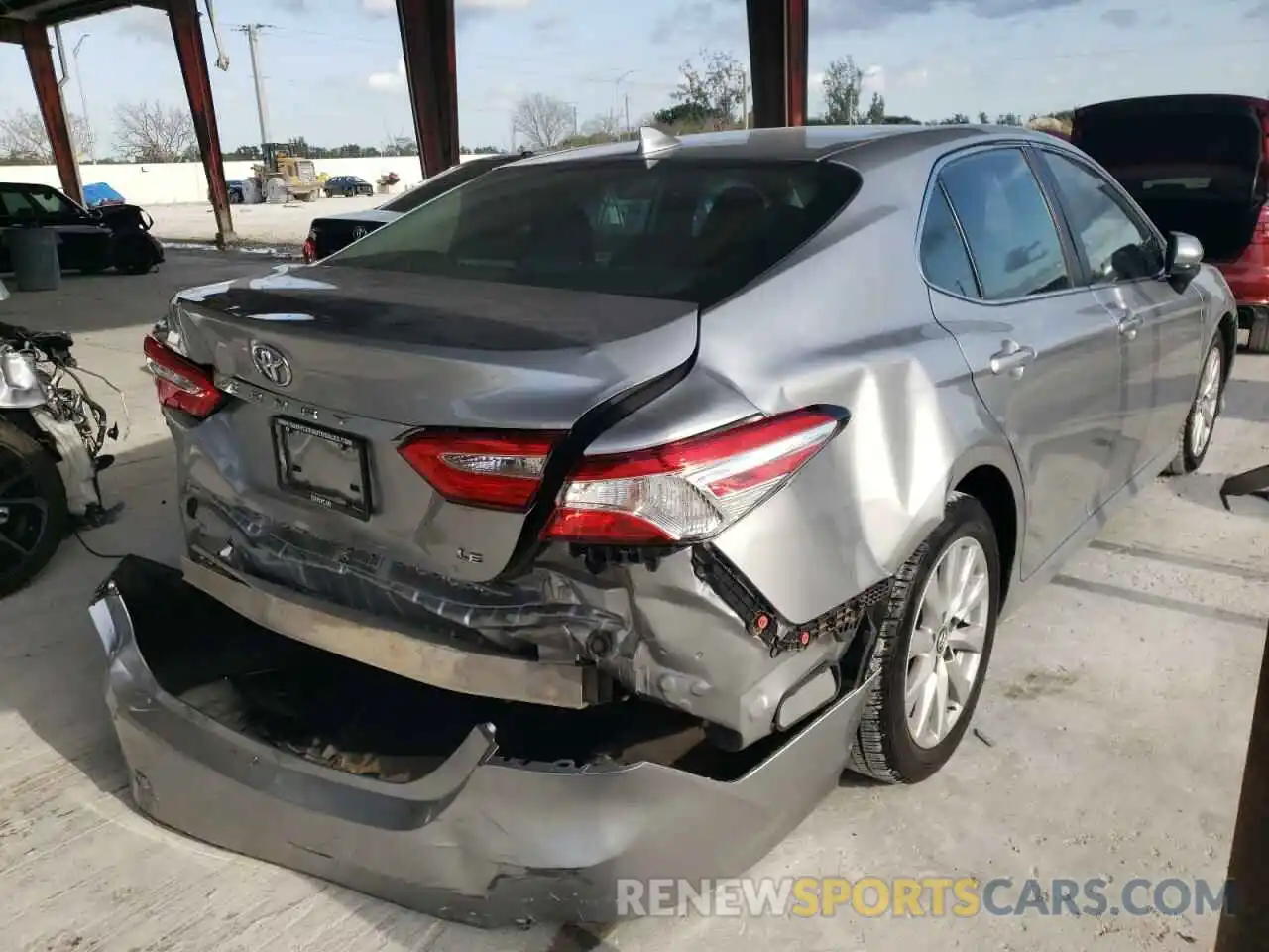 4 Photograph of a damaged car 4T1B11HK9KU687231 TOYOTA CAMRY 2019