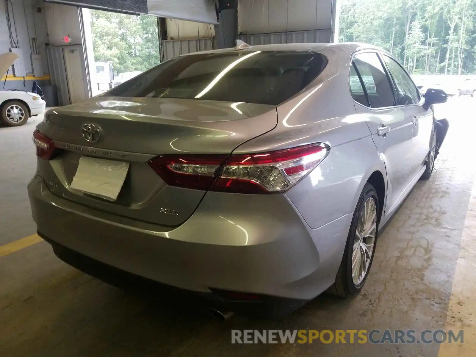 4 Photograph of a damaged car 4T1B11HK9KU693594 TOYOTA CAMRY 2019