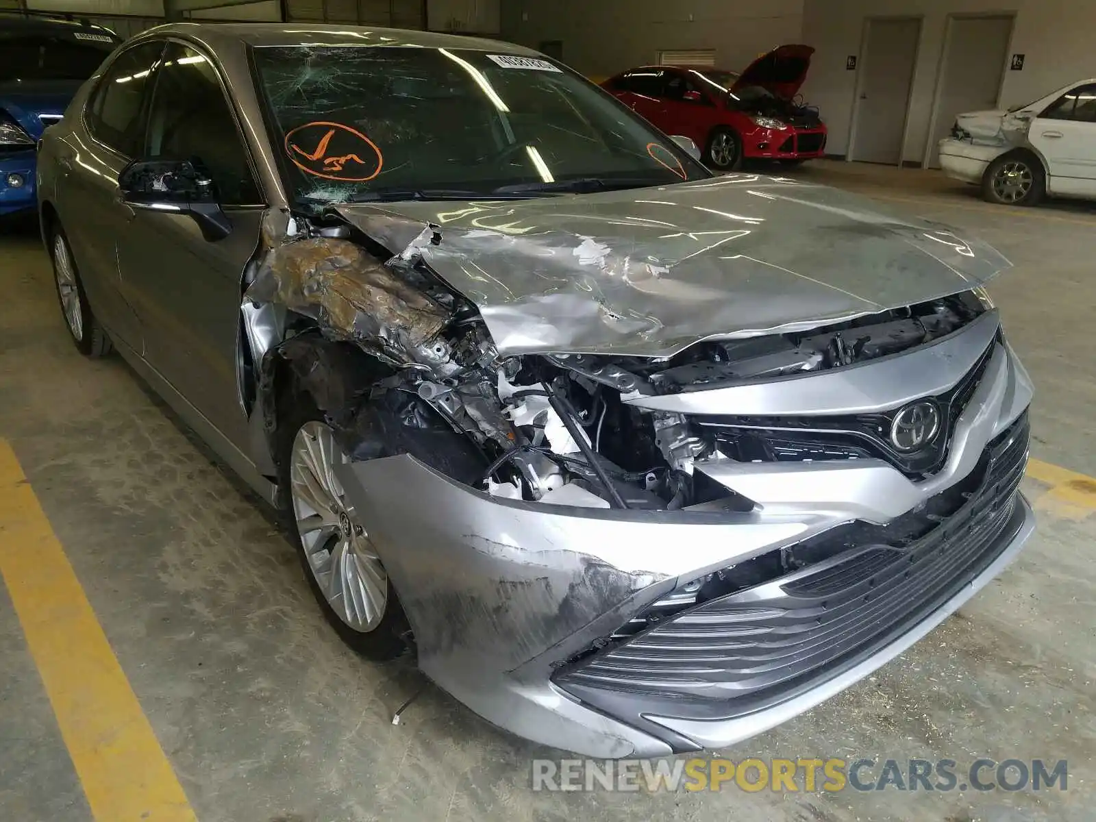 9 Photograph of a damaged car 4T1B11HK9KU693594 TOYOTA CAMRY 2019