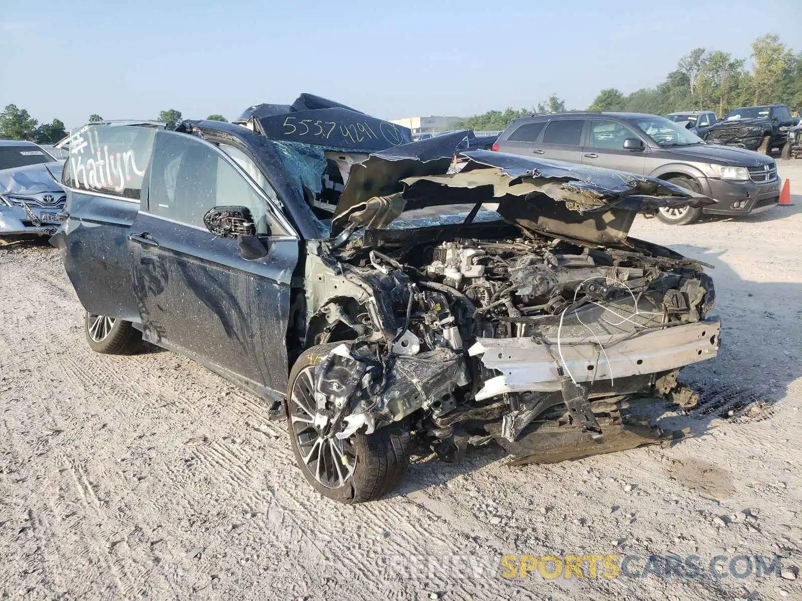 1 Photograph of a damaged car 4T1B11HK9KU693952 TOYOTA CAMRY 2019