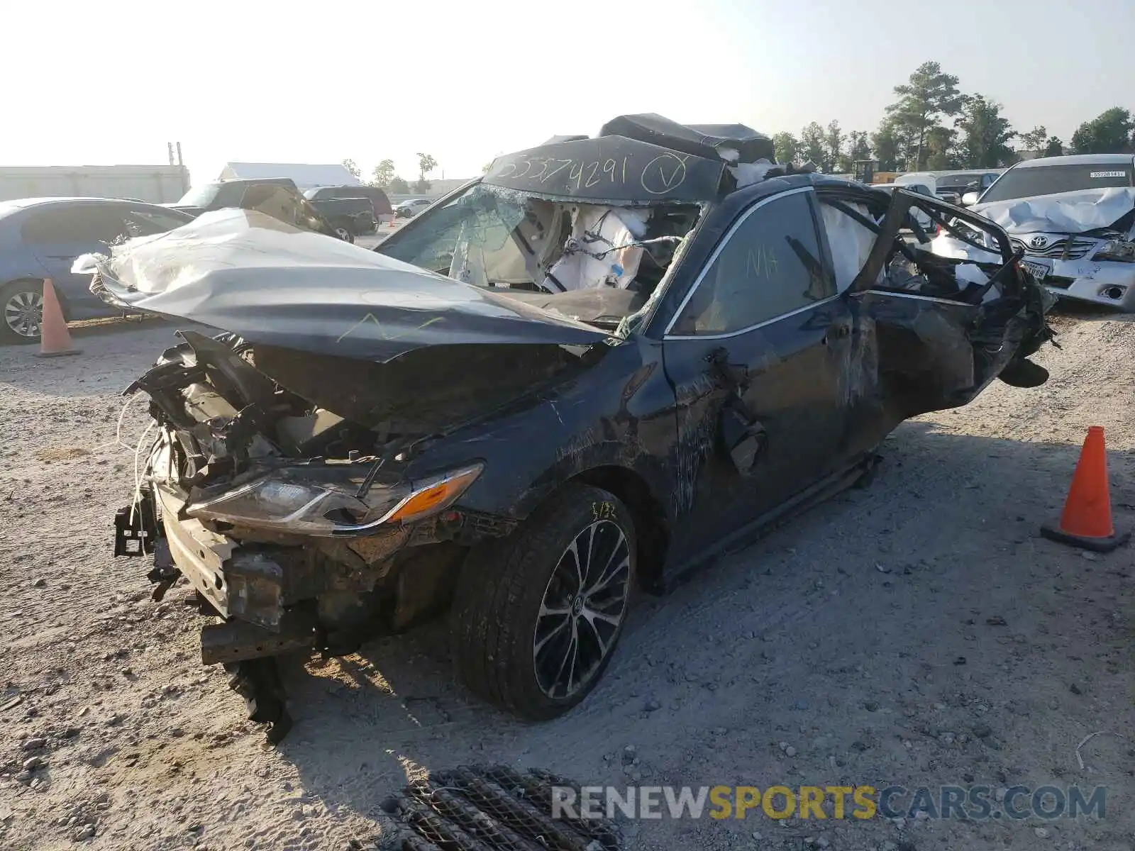 2 Photograph of a damaged car 4T1B11HK9KU693952 TOYOTA CAMRY 2019