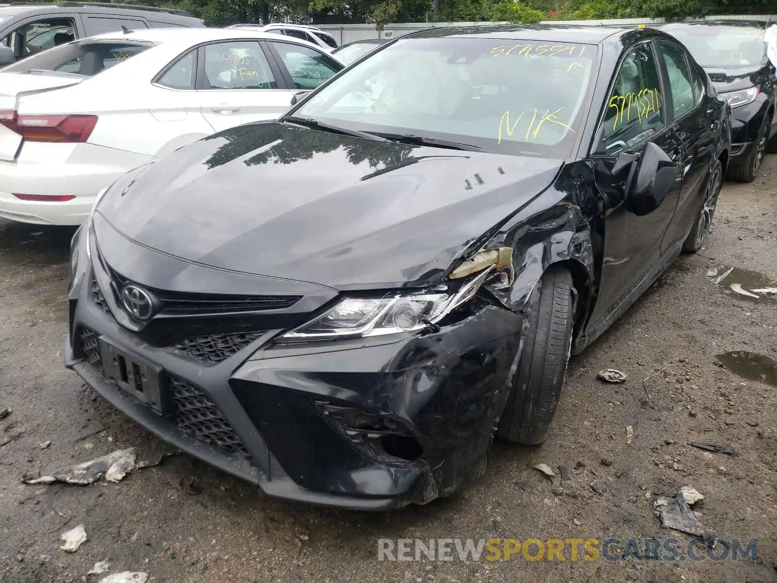 2 Photograph of a damaged car 4T1B11HK9KU696981 TOYOTA CAMRY 2019