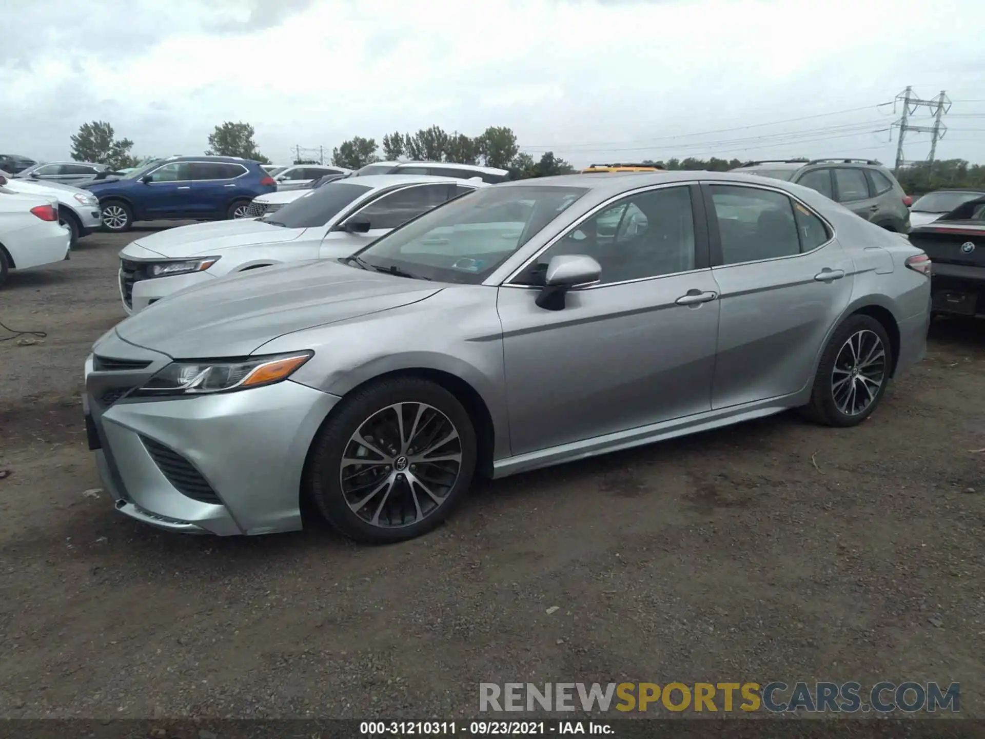 2 Photograph of a damaged car 4T1B11HK9KU697077 TOYOTA CAMRY 2019