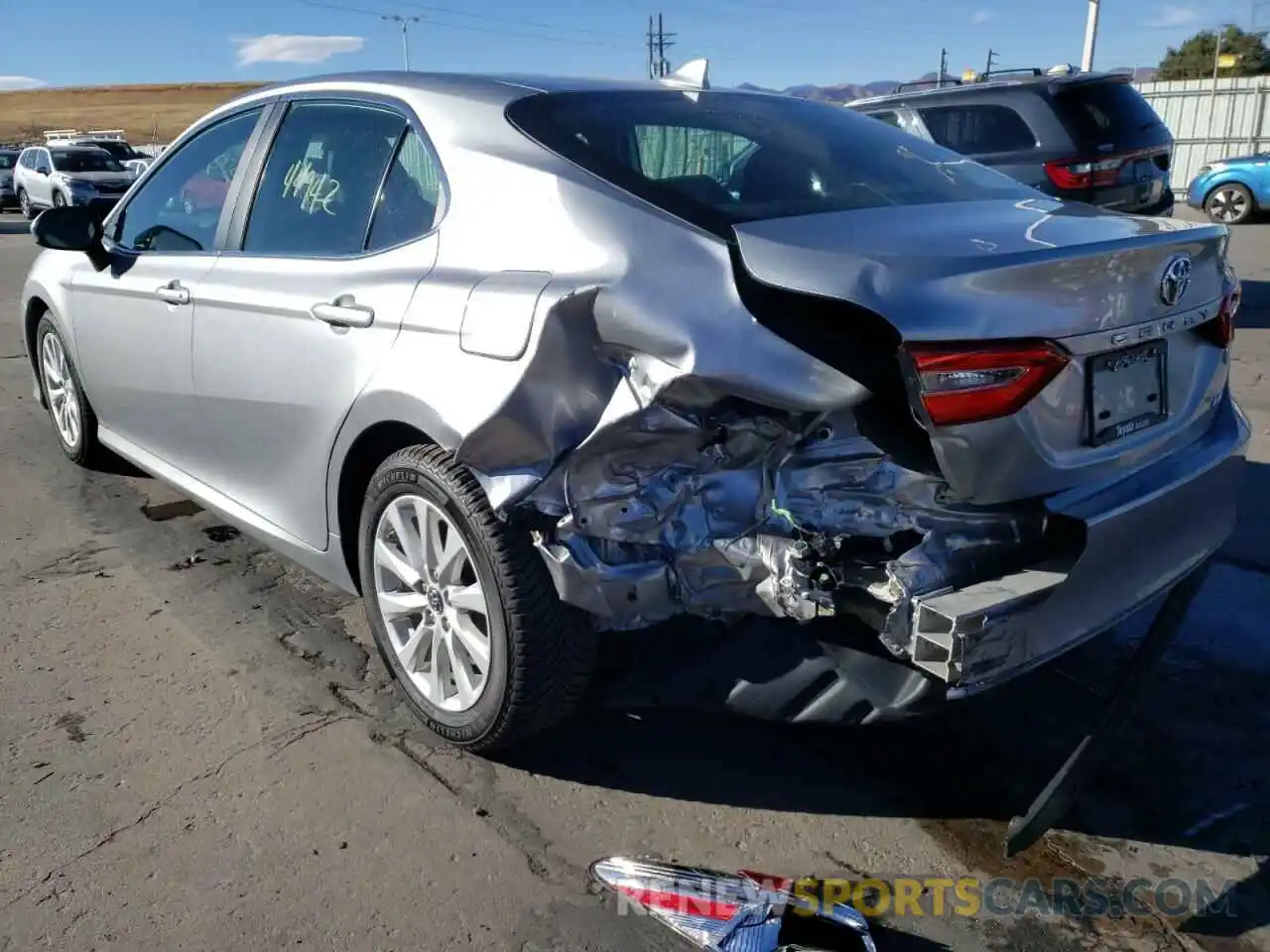 3 Photograph of a damaged car 4T1B11HK9KU697581 TOYOTA CAMRY 2019