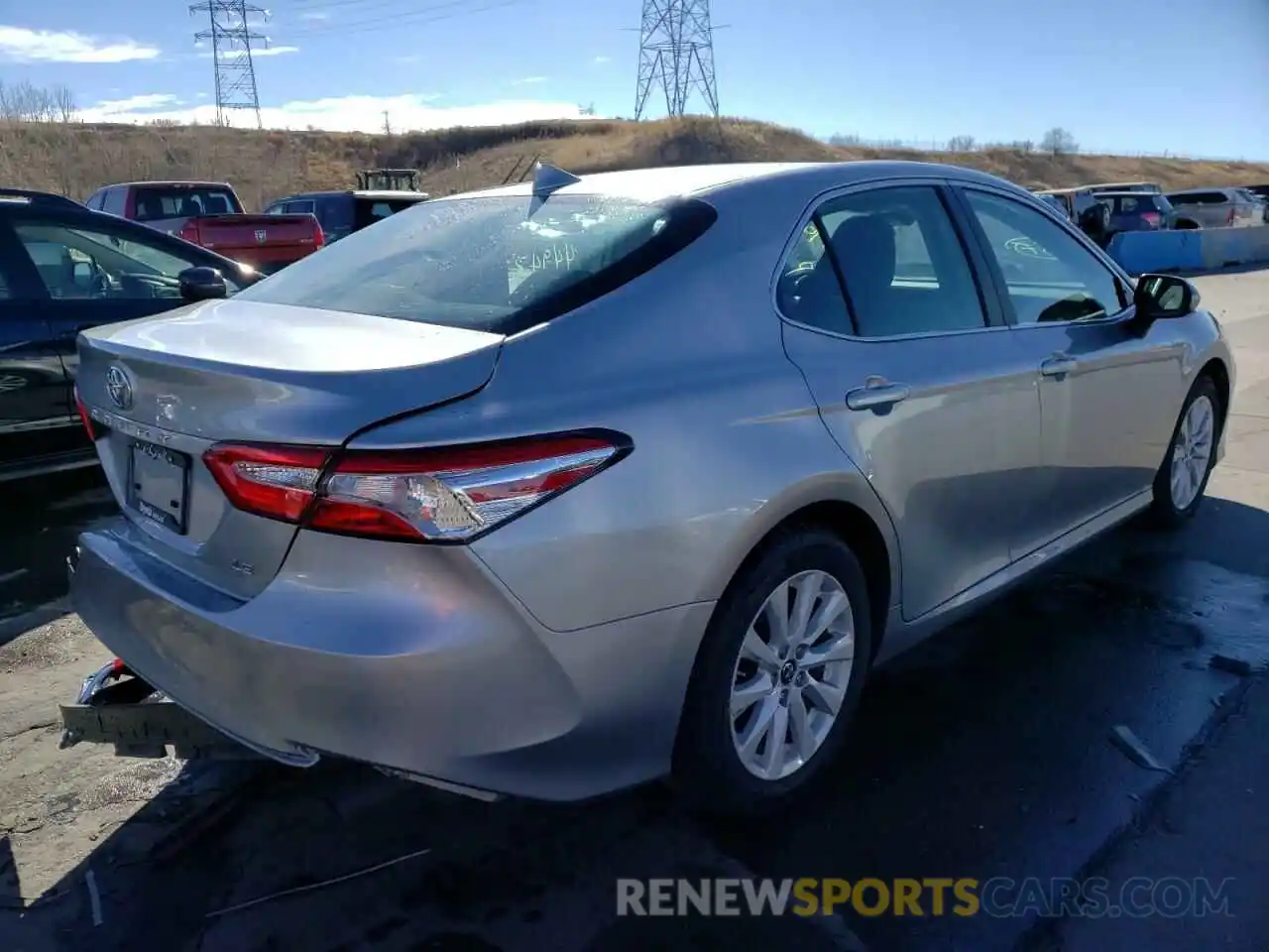 4 Photograph of a damaged car 4T1B11HK9KU697581 TOYOTA CAMRY 2019