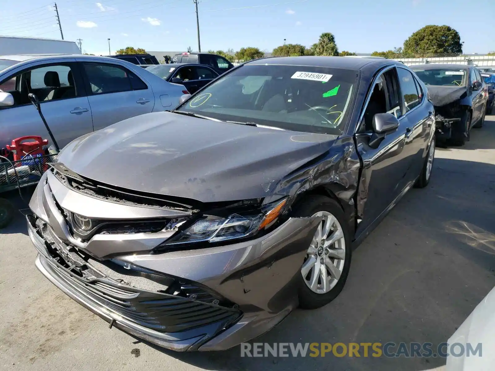 2 Photograph of a damaged car 4T1B11HK9KU698732 TOYOTA CAMRY 2019