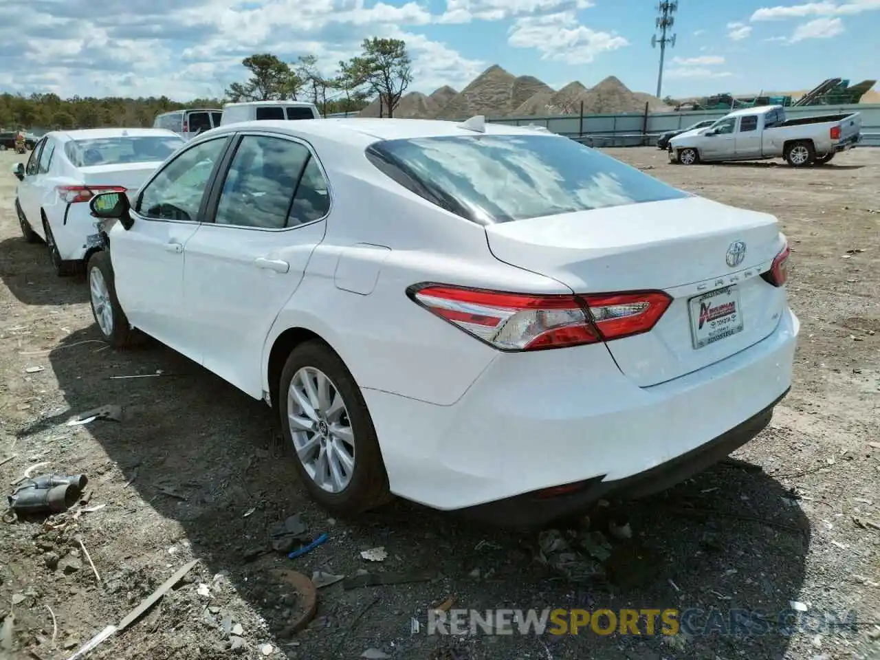 3 Photograph of a damaged car 4T1B11HK9KU701418 TOYOTA CAMRY 2019