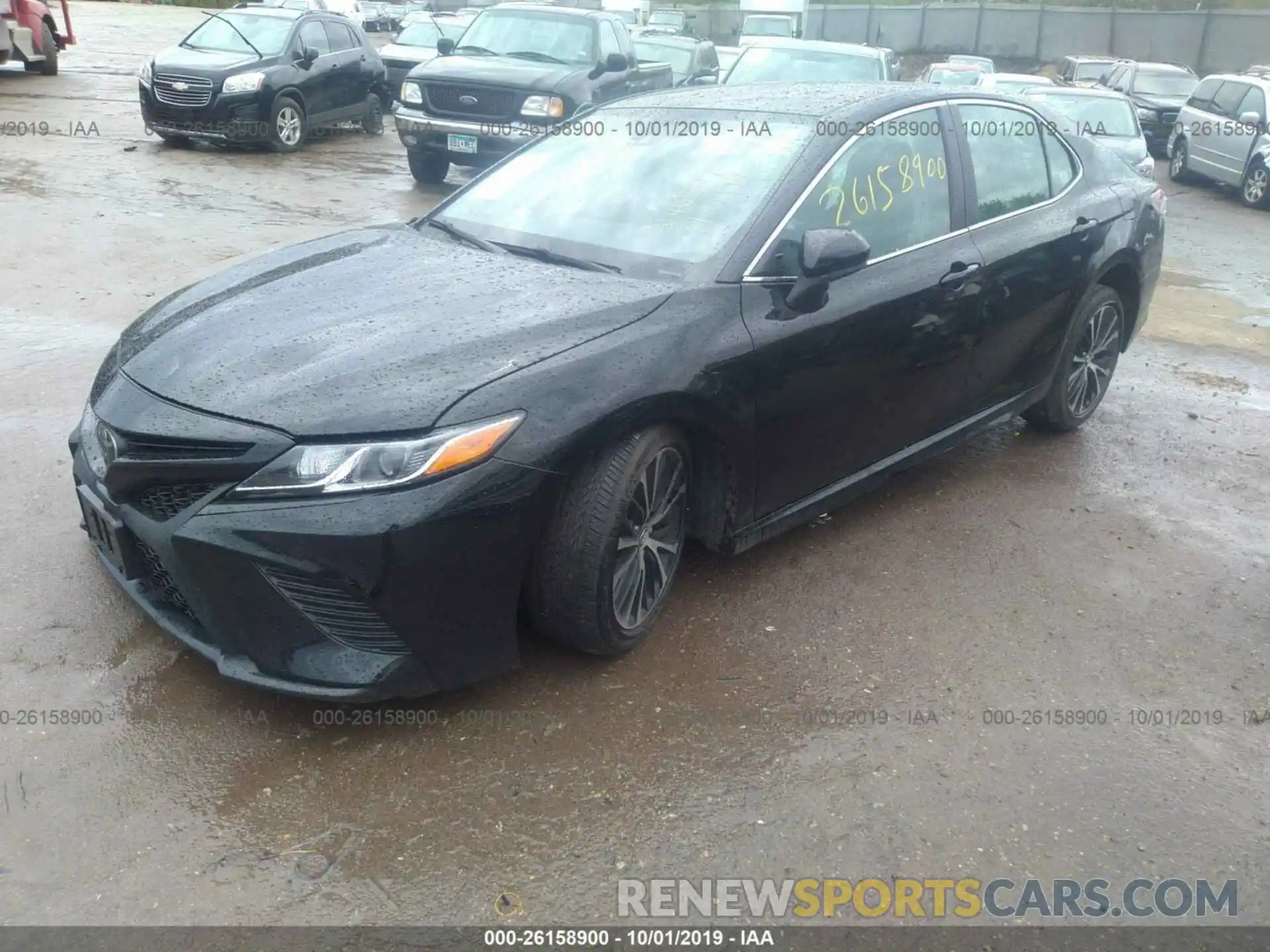 2 Photograph of a damaged car 4T1B11HK9KU704075 TOYOTA CAMRY 2019