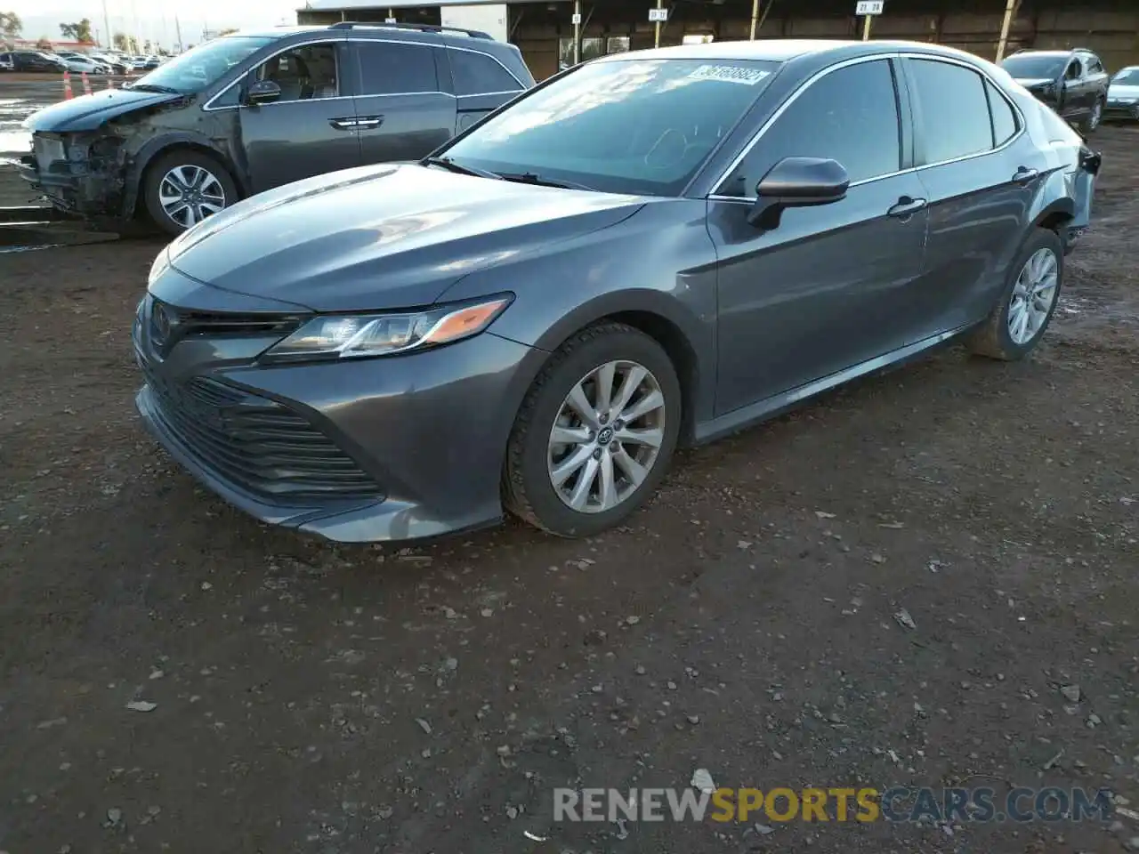 2 Photograph of a damaged car 4T1B11HK9KU705727 TOYOTA CAMRY 2019