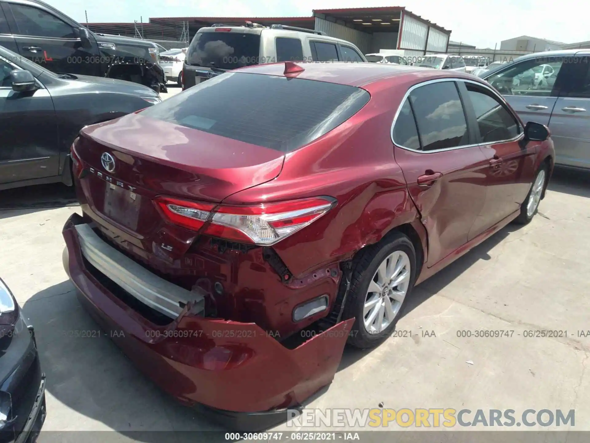 4 Photograph of a damaged car 4T1B11HK9KU708269 TOYOTA CAMRY 2019