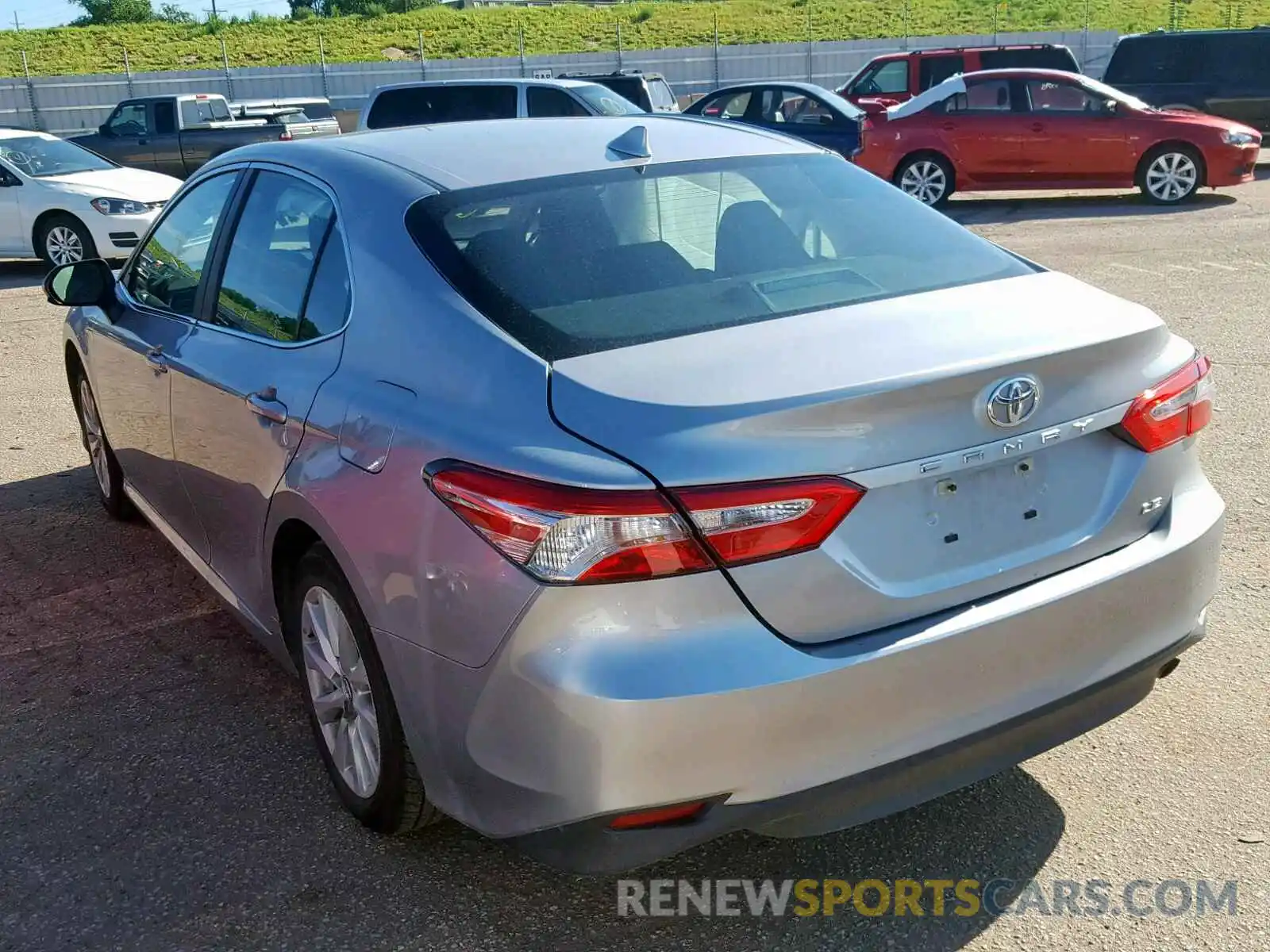 3 Photograph of a damaged car 4T1B11HK9KU711883 TOYOTA CAMRY 2019