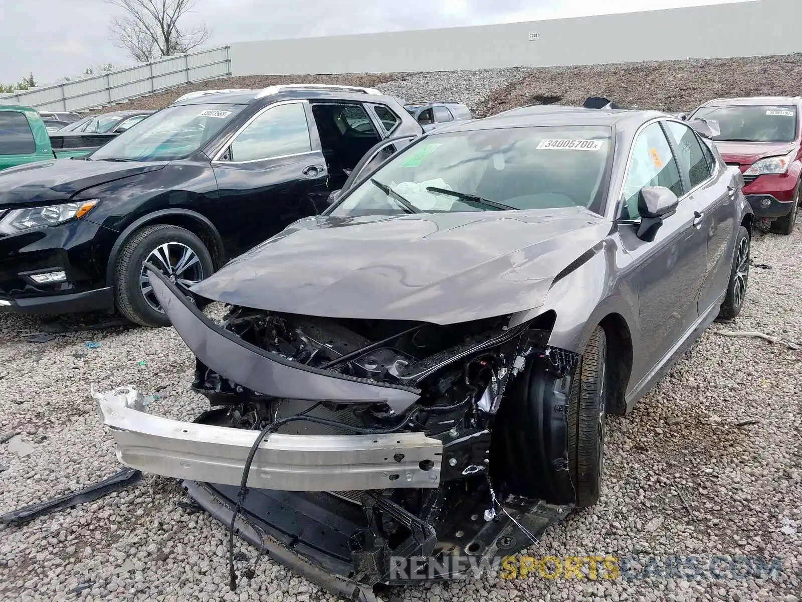 2 Photograph of a damaged car 4T1B11HK9KU712323 TOYOTA CAMRY 2019