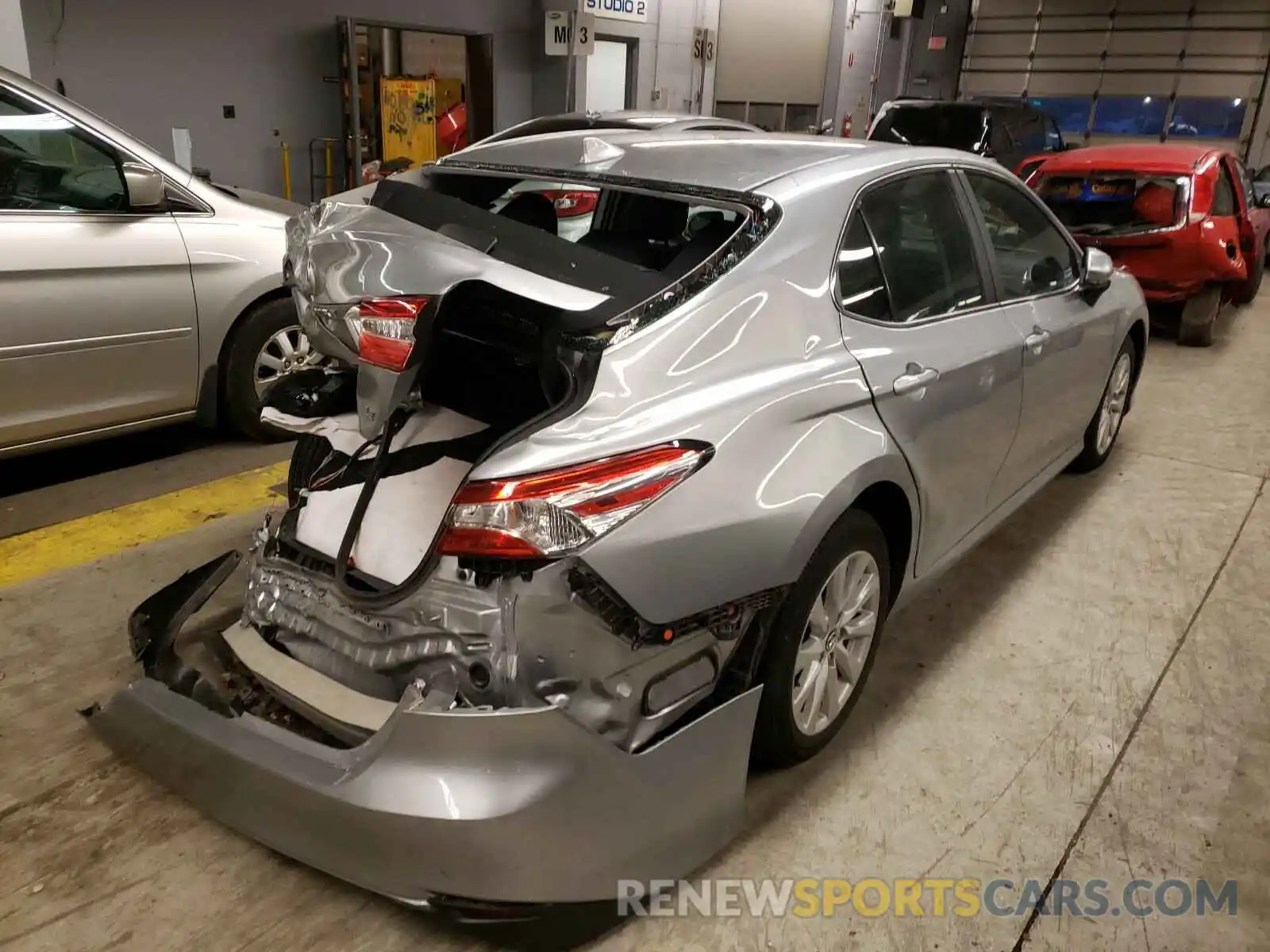 4 Photograph of a damaged car 4T1B11HK9KU713567 TOYOTA CAMRY 2019