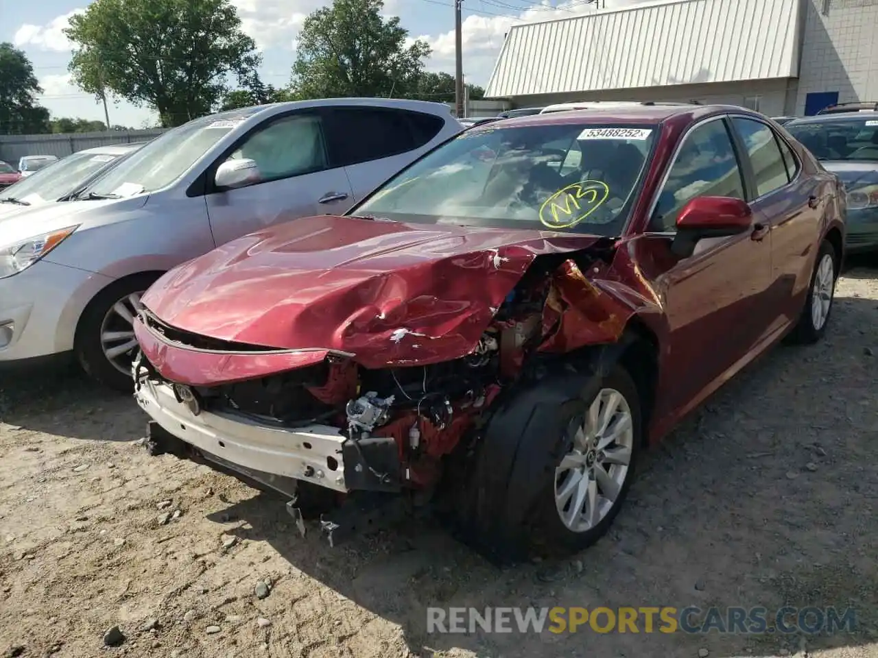 2 Photograph of a damaged car 4T1B11HK9KU715299 TOYOTA CAMRY 2019