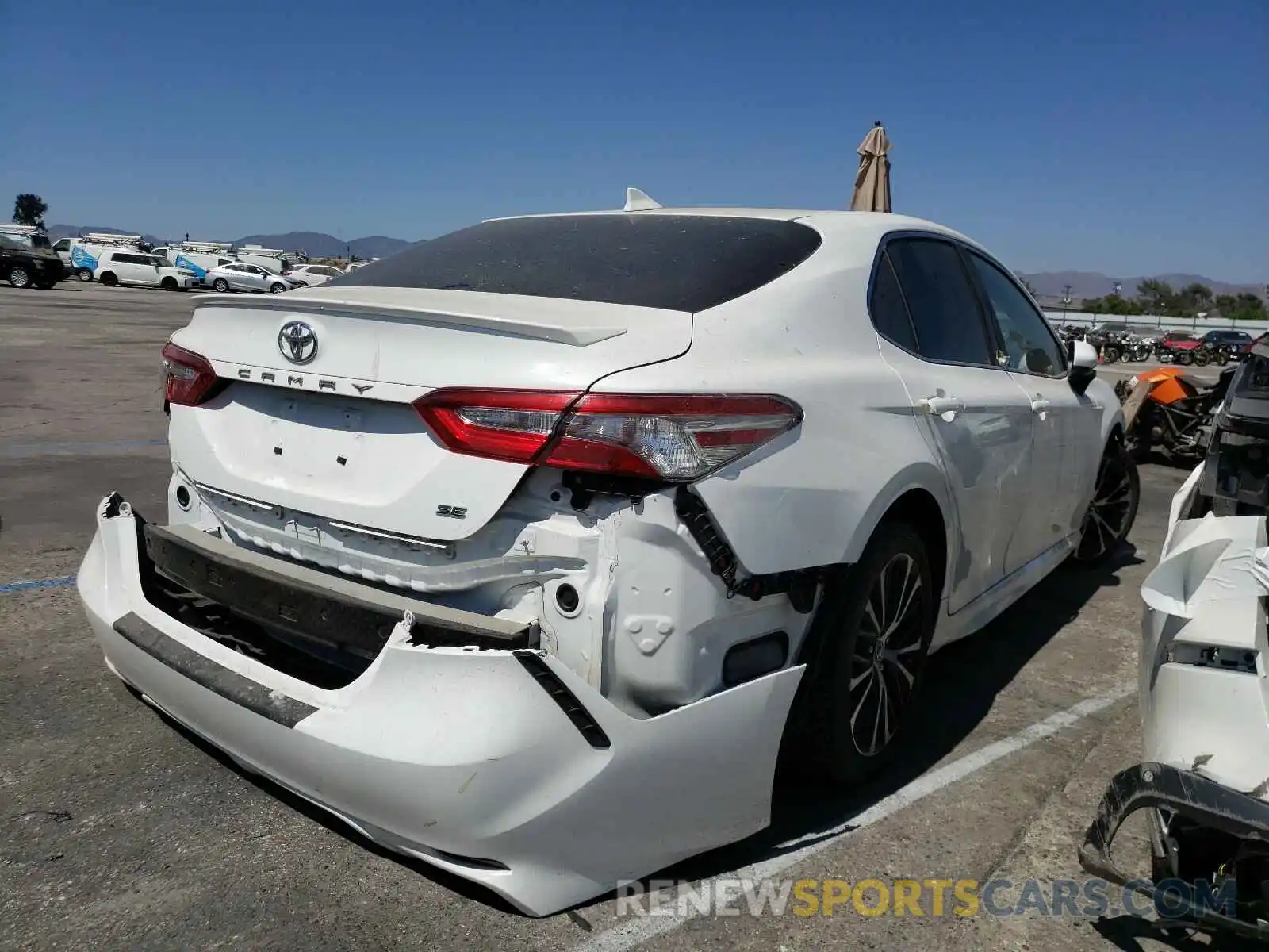 4 Photograph of a damaged car 4T1B11HK9KU715500 TOYOTA CAMRY 2019