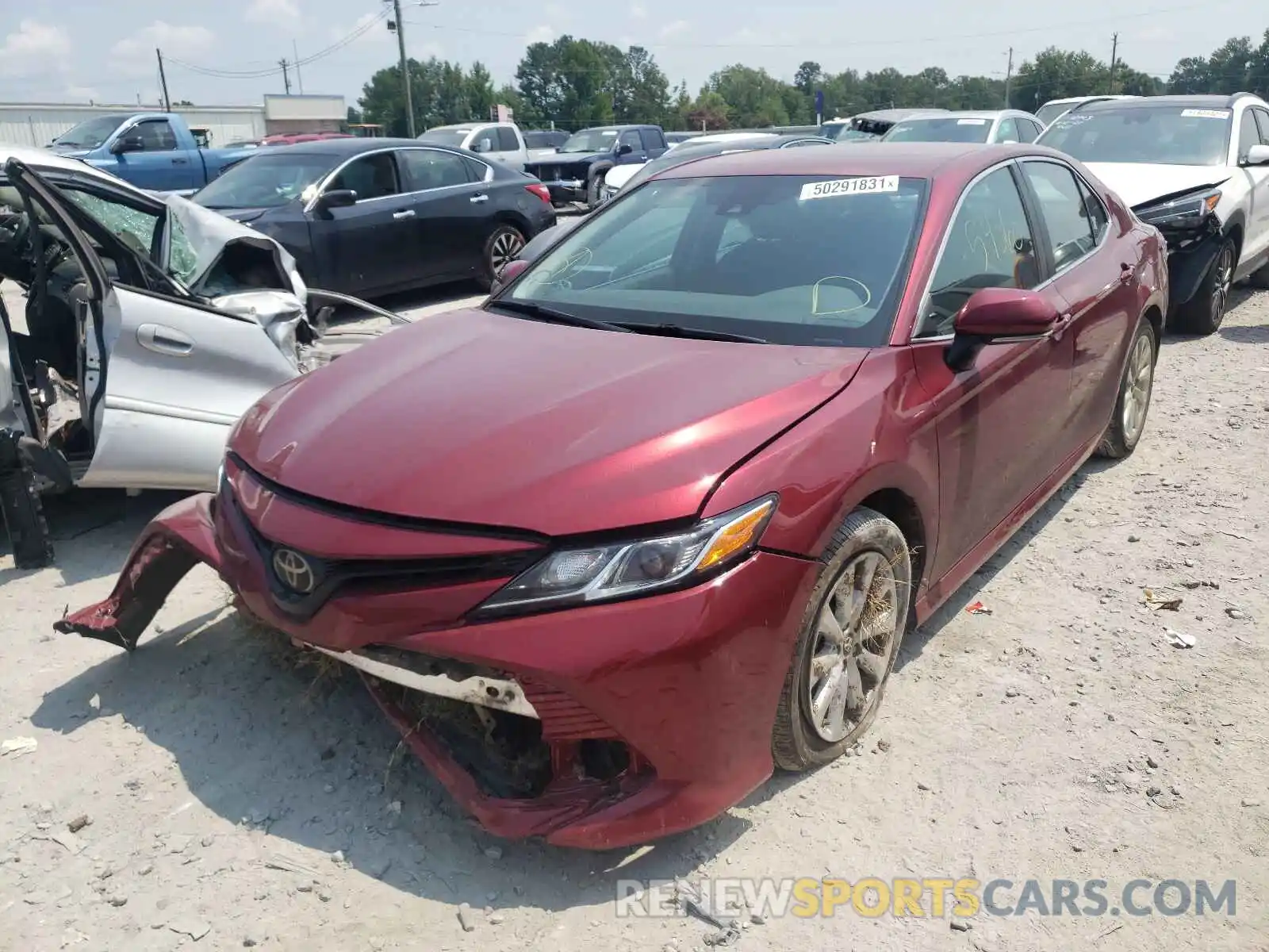 2 Photograph of a damaged car 4T1B11HK9KU716243 TOYOTA CAMRY 2019