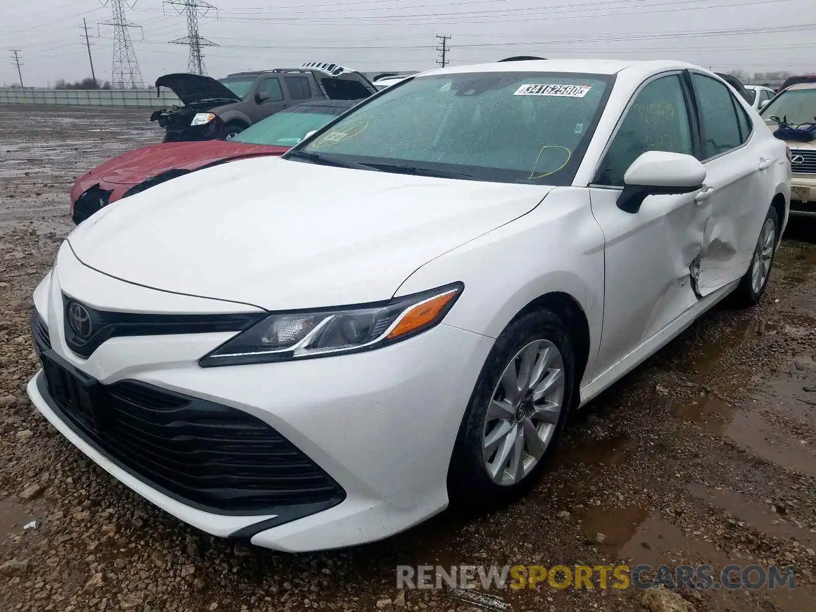 2 Photograph of a damaged car 4T1B11HK9KU716565 TOYOTA CAMRY 2019