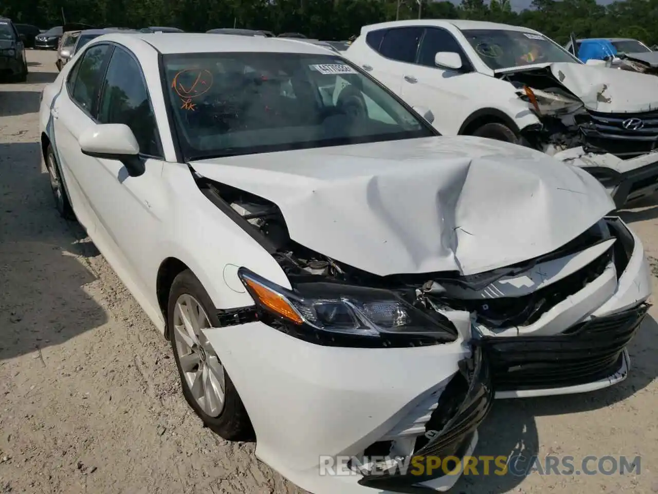 1 Photograph of a damaged car 4T1B11HK9KU717070 TOYOTA CAMRY 2019