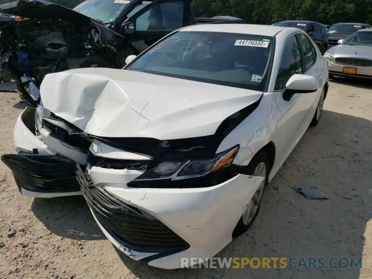 2 Photograph of a damaged car 4T1B11HK9KU717070 TOYOTA CAMRY 2019