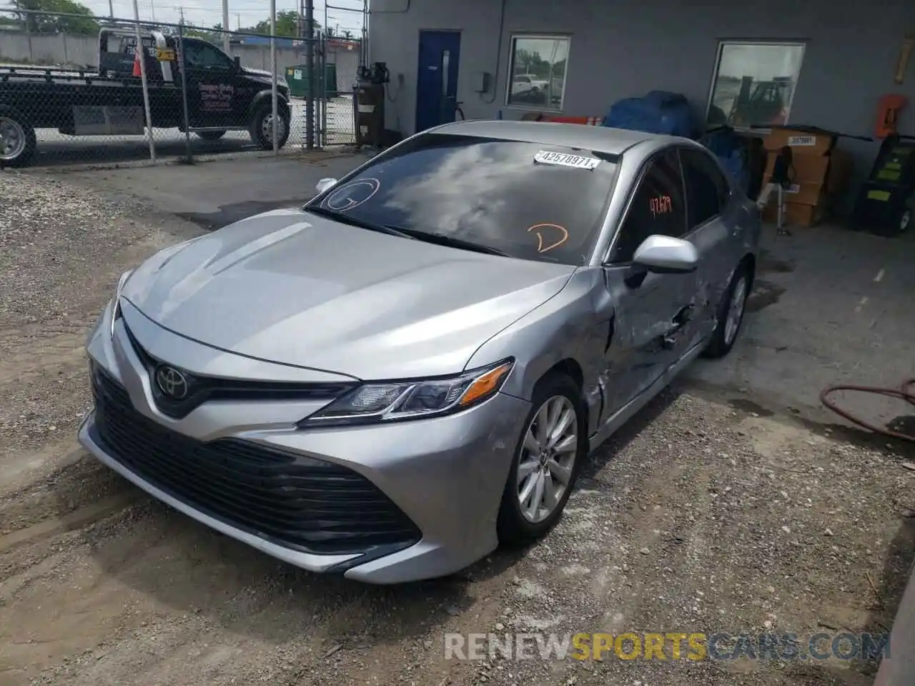 2 Photograph of a damaged car 4T1B11HK9KU719367 TOYOTA CAMRY 2019