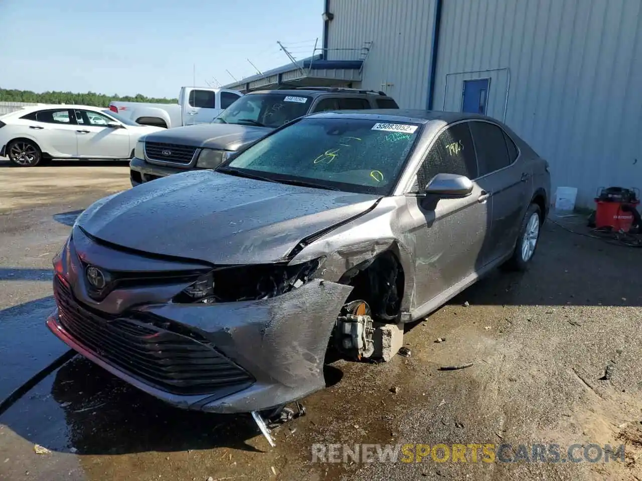 2 Photograph of a damaged car 4T1B11HK9KU720423 TOYOTA CAMRY 2019