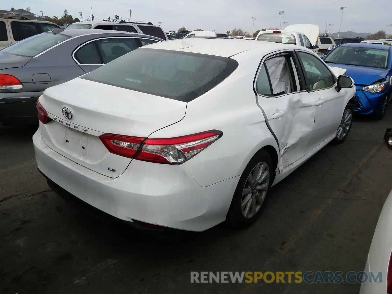 4 Photograph of a damaged car 4T1B11HK9KU720552 TOYOTA CAMRY 2019