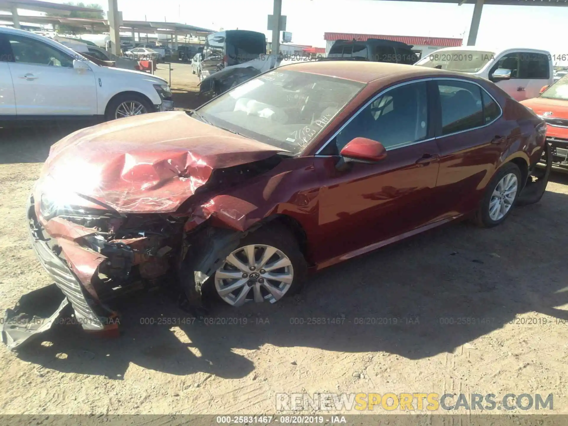 2 Photograph of a damaged car 4T1B11HK9KU720566 TOYOTA CAMRY 2019