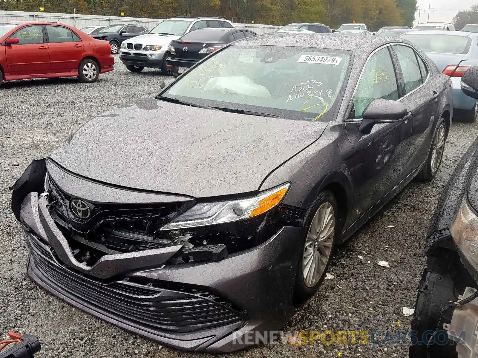 2 Photograph of a damaged car 4T1B11HK9KU721023 TOYOTA CAMRY 2019