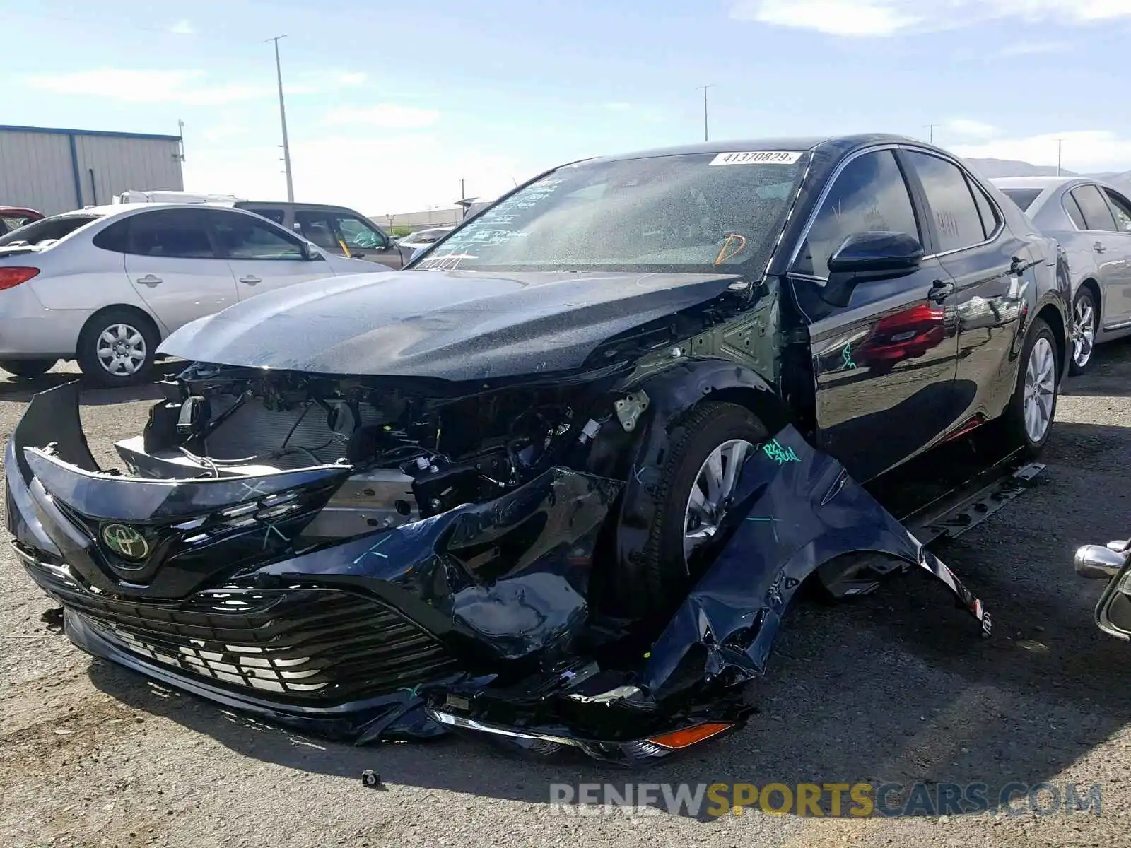 2 Photograph of a damaged car 4T1B11HK9KU721815 TOYOTA CAMRY 2019